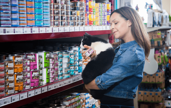 female-at-pet-store-with-her-cat